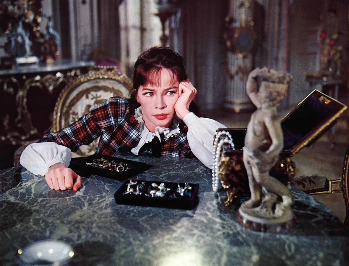 Gigi (Leslie Caron) must learn etiquette and culture, in Gigi." (MGM)