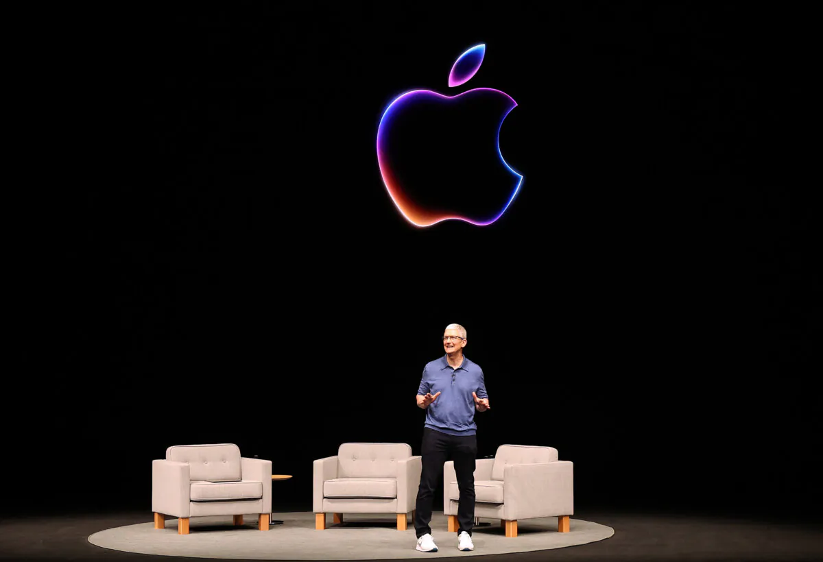 Apple CEO Tim Cook delivers remarks at the start of the Apple Worldwide Developers Conference (WWDC) on June 10, 2024 in Cupertino, California. (Justin Sullivan/Getty Images)