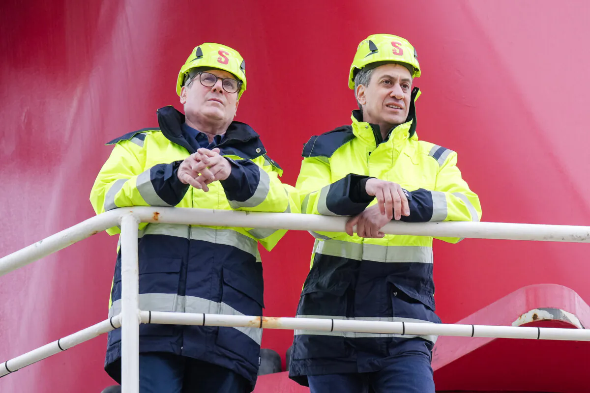 Labour leader Sir Keir Starmer (L) and shadow energy secretary Ed Miliband view and tour Excalibur, an offshore jack up platform for wind turbine construction and maintenance in Holyhead, Wales, on March 25, 2024. (Christopher Furlong/Getty Images)