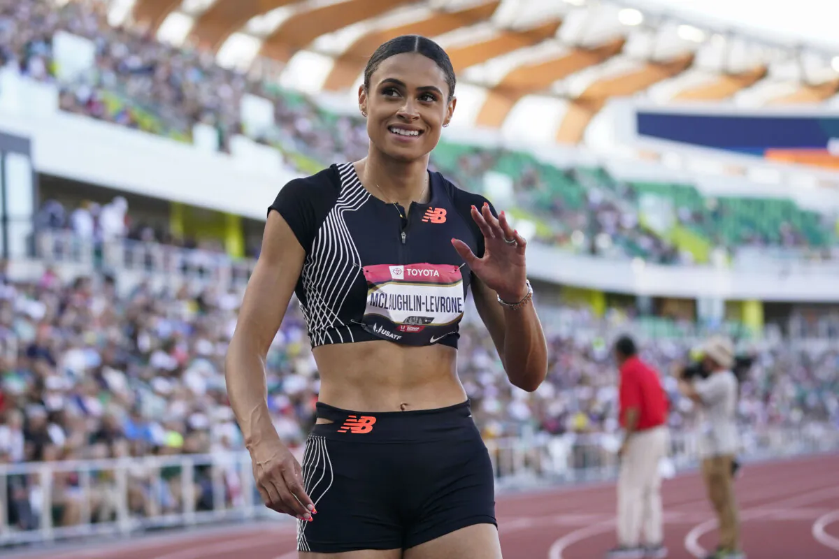Sydney McLaughlin-Levrone waves to the crowd after winning the women's 400 meters during the U.S. track and field championships in Eugene, Ore., on July 8, 2023. (Ashley Landis/AP Photo)