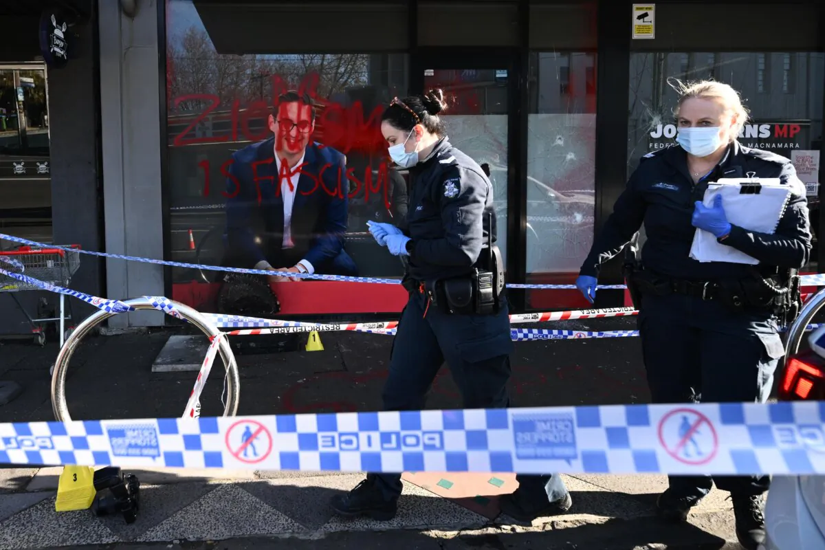 Victoria Police investigate the fire and criminal damage at Federal Labor MP Josh Burns' electoral office in Melbourne, Australia, on June 19, 2024. (AAP Image/Joel Carrett)