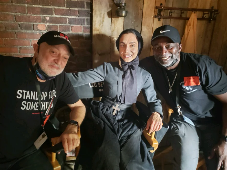 Producer Jonathan Sanger with Actress Cristiana Del’Anna (as Mother Cabrini), and associate producer M. Jones on the set of the movie "Cabrini". (Courtesy of Cabrini Films and Angel Studios. Photo by M. Jones)