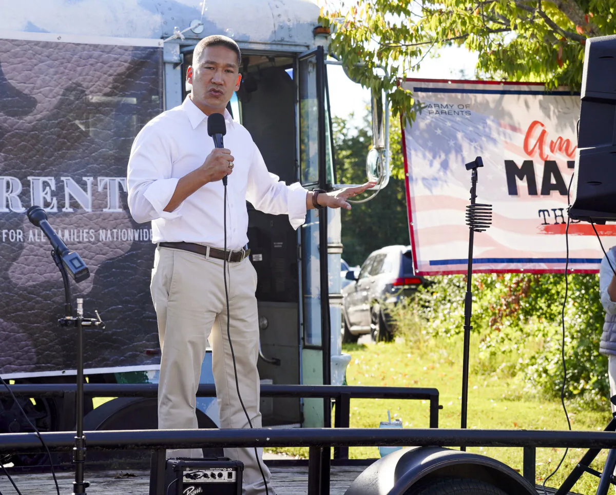 Hung Cao, Republican candidate for Virginia's 10th congressional district in the midterms, at a rally outside the Loudoun County Public Schools (LCPS) administration building in Ashburn, Va., on Sept. 13, 2022. (Terri Wu/The Epoch Times)