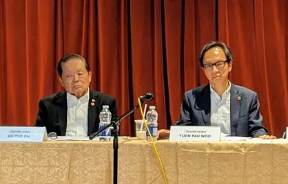 Sen. Victor Oh (L) and Sen. Yuen Pau Woo at a press conference in Montreal on Dec. 1, 2023, in support of two organizations  being investigated by the RCMP for allegedly operating as secret Chinese police stations. (Hua Xue/NTD Television)