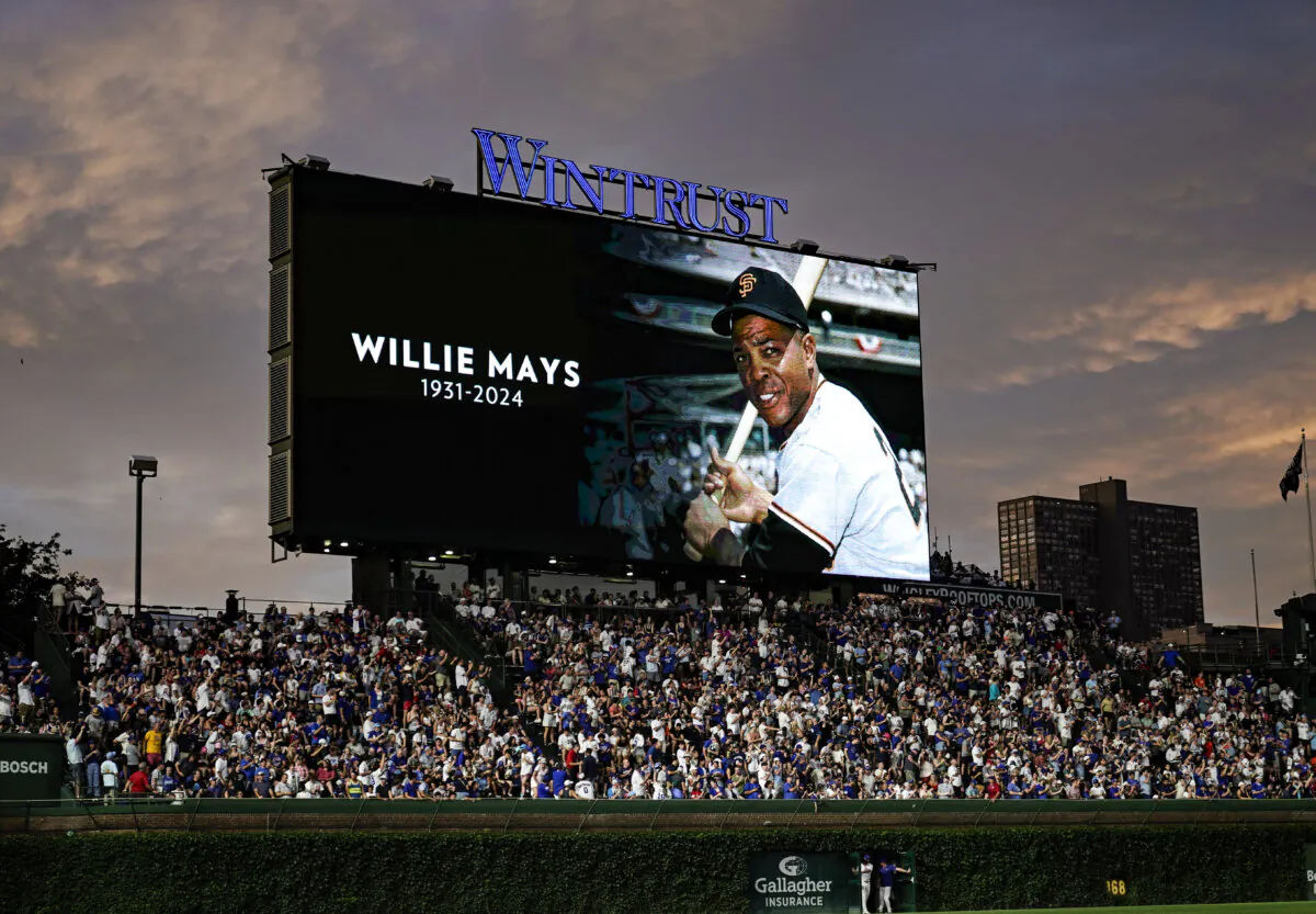 An image of Willie Mays is displayed on the video board during a moment of silence in the sixth inning of a game between the San Francisco Giants and Chicago Cubs at Wrigley Field in Chicago on June 18, 2024. (Nuccio DiNuzzo/Getty Images)