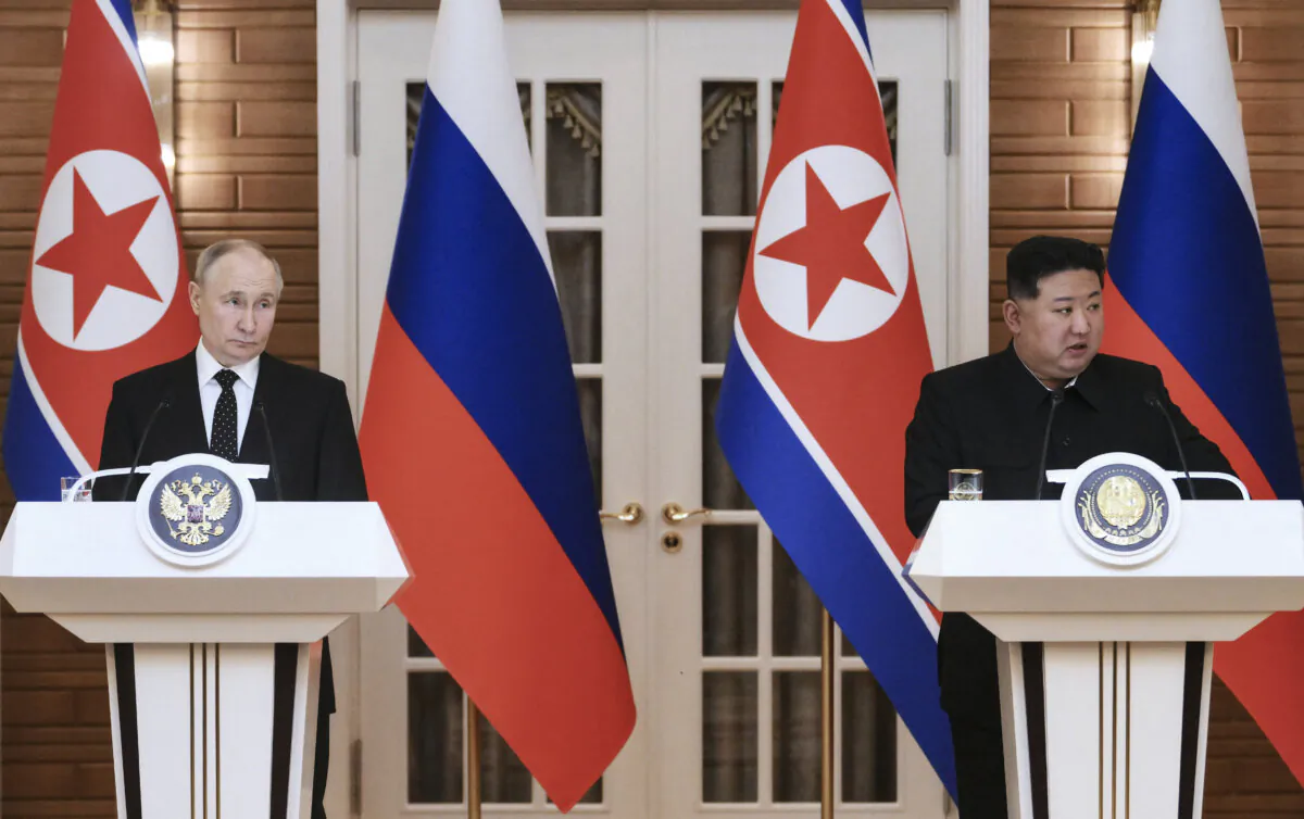 Russian President Vladimir Putin and North Korea's leader Kim Jong Un talk to the media following their bilaterial talks at Kumsusan state residence in Pyongyang, North Korea, on June 19, 2024. (Kristina Kormilitsyna/AFP via Getty Images)