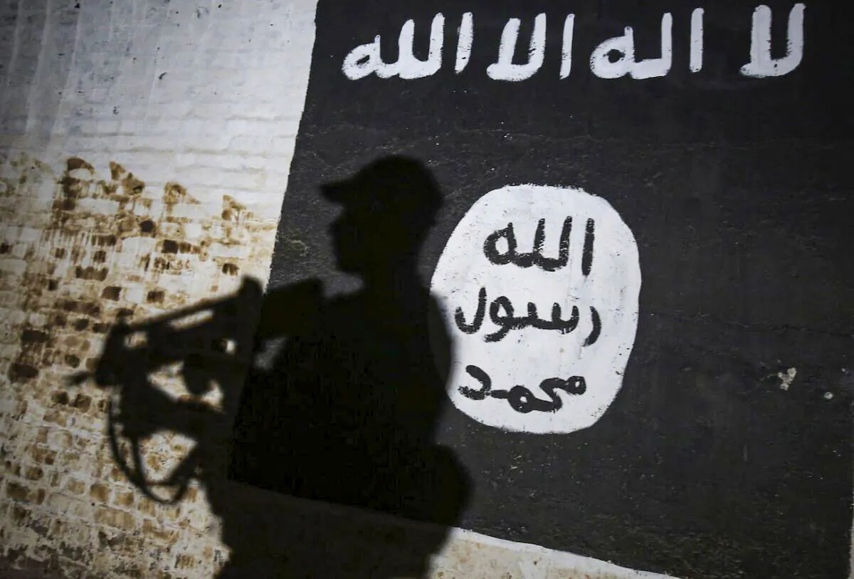 A mural bears the logo of the ISIS terrorist group in the village of Albu Sayf, Iraq, on March 1, 2017. (Ahmad Al-Rubaye/AFP via Getty Images)