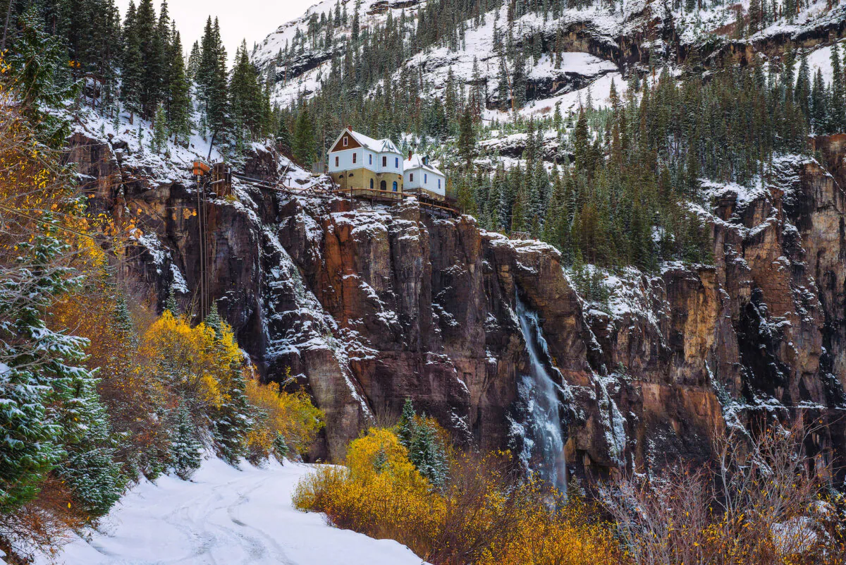 Shown in autumn, Bridal Veil Falls sits with a power plant perched at its top in Telluride, Colorado. (Miroslav Liska/Dreamstime/TNS)