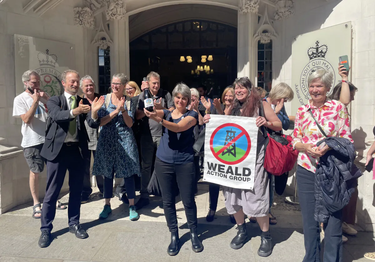 Environmental campaigner Sarah Finch (centre) outside the Supreme Court in London, June 20, 2024, (Callum Parke/PA Wire) 