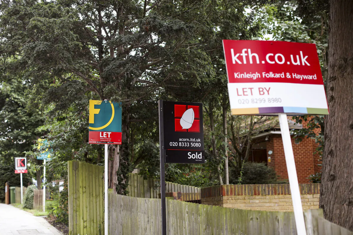 A for sale signs stands outside residential housing in London, on Aug. 10, 2017. (Dan Kitwood/Getty Images)