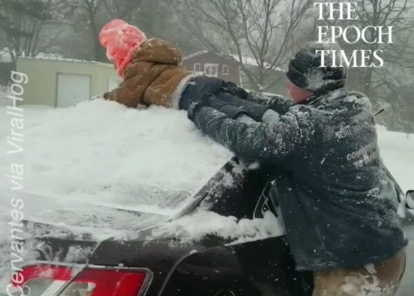 Dad Uses Son to Clean Snow Off Car