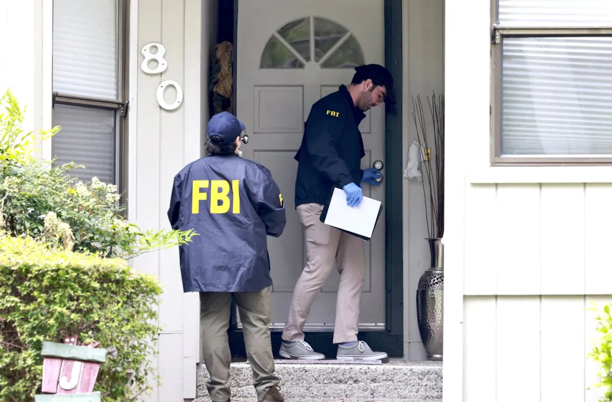 FBI agents raid a home on Maiden Lane where Oakland Mayor Sheng Thao allegedly lives in Oakland, Calif., on June 20, 2024. (Jessica Christian/San Francisco Chronicle via AP)