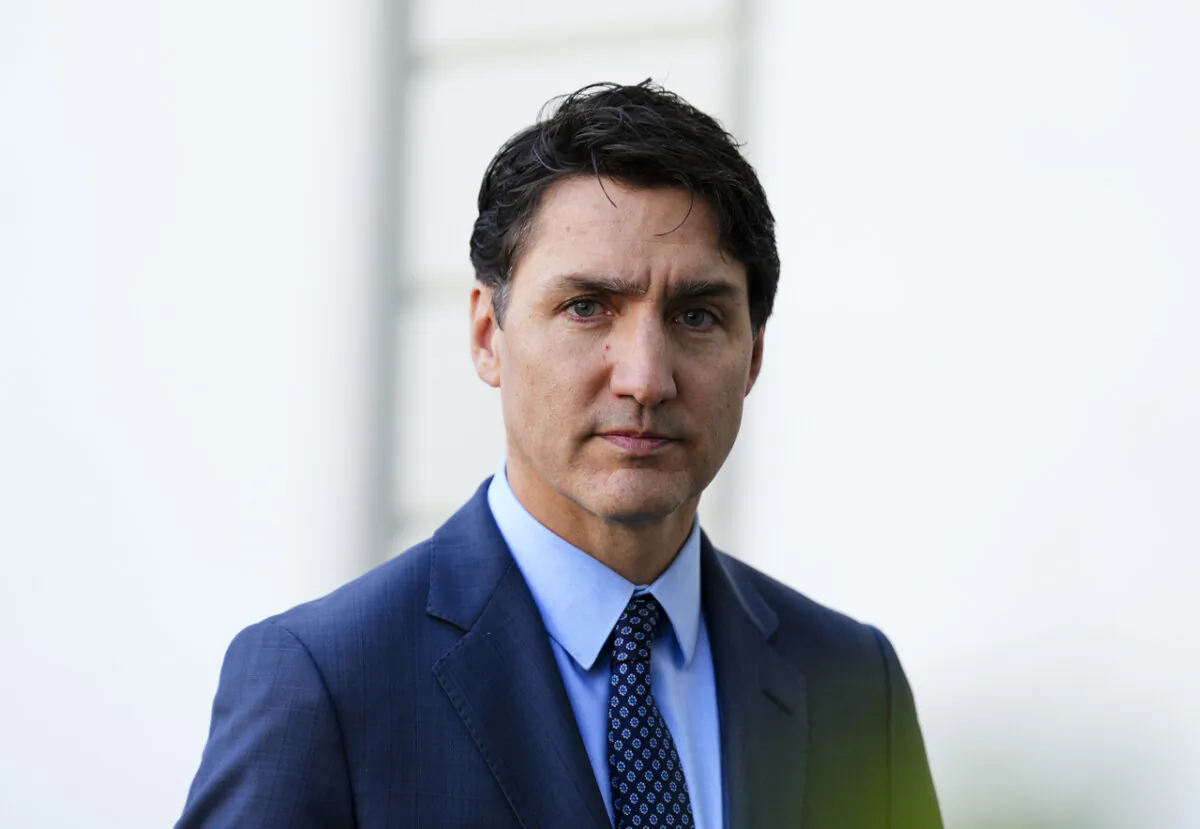 Prime Minister Justin Trudeau arrives to talk to reporters at the Ukraine peace summit media centre at the Burgenstock Resort in Obburgen, Switzerland, on June 16, 2024. (The Canadian Press/Sean Kilpatrick)