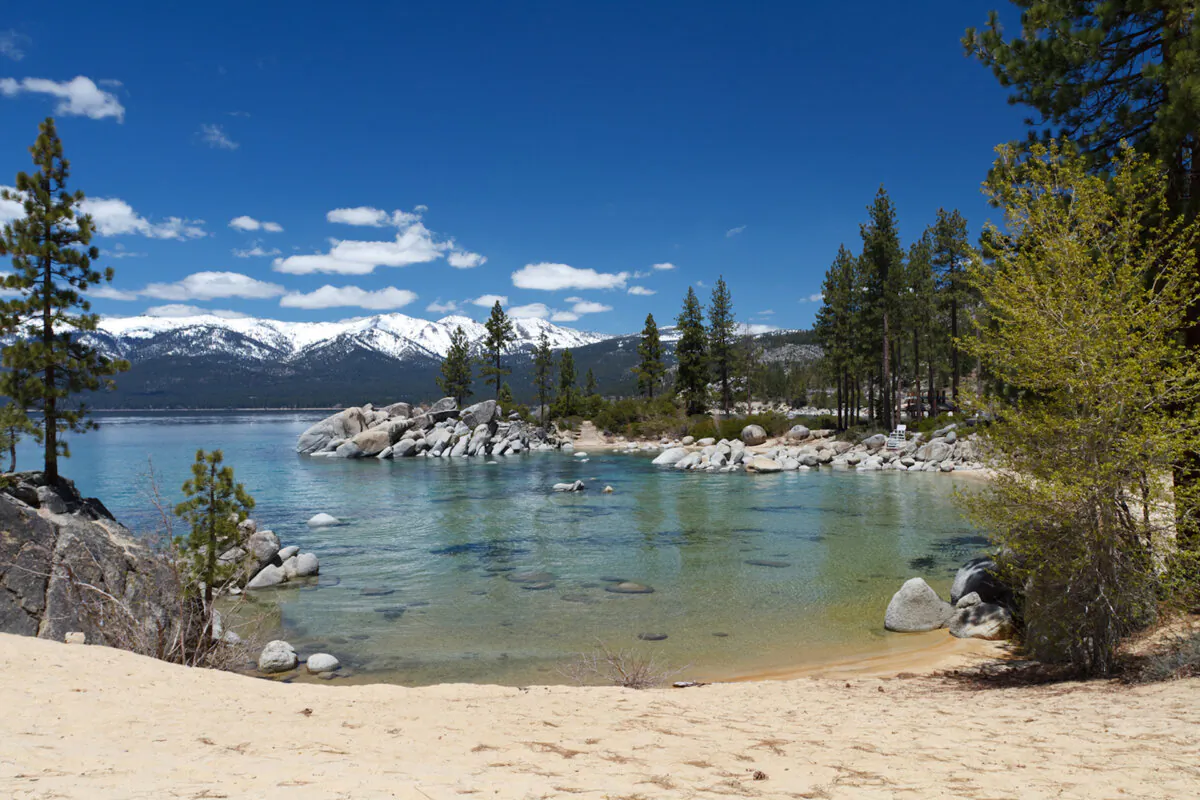 The popular Sand Harbor beach on Lake Tahoe's pristine northeastern banks will begin implementing a reservation system next year, with a trial period beginning in August. (Dreamstime/TNS)