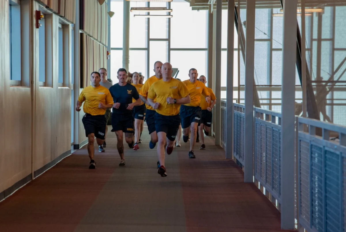  Sailors attached to Navy Operational Support Center Fort Carson complete the 1.5 mile run portion of the Navy's Physical Fitness Assessment on Oct. 19, 2019. (U.S. Navy photo by Mass Communication Specialist 1st Class Gilbert Bolibol/Released)
