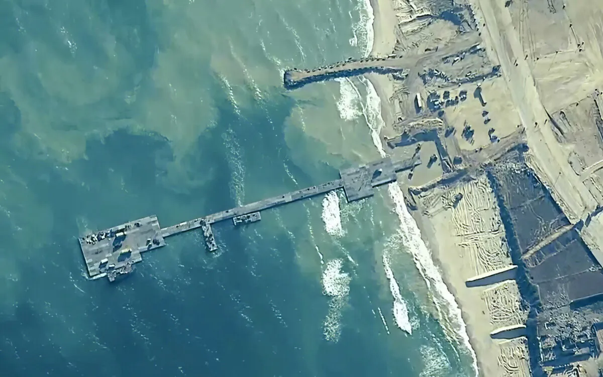 Soldiers of the U.S. Army, U.S. Navy sailors, and Israel Defense Forces are pictured placing the Trident Pier on the coast of Gaza Strip on May 16, 2024. (U.S. Central Command via AP)