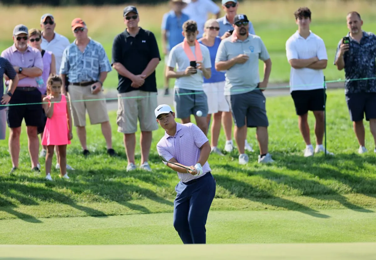 Tom Kim of South Korea plays a third shot on the fourth hole during the second round of the Travelers Championship at TPC River Highlands in Cromwell, Conn., on June 21, 2024. (Andy Lyons/Getty Images)