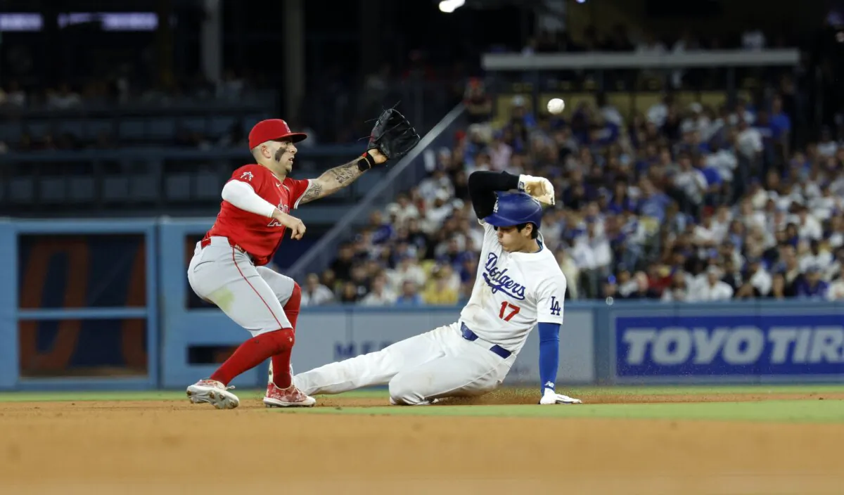 Shohei Ohtani (17) of the Los Angeles Dodgers is caught stealing second base as he he tagged out by Zach Neto (9) of the Los Angeles Angels during the eight inning in Los Angeles on June 21, 2024. (Kevork Djansezian/Getty Images)