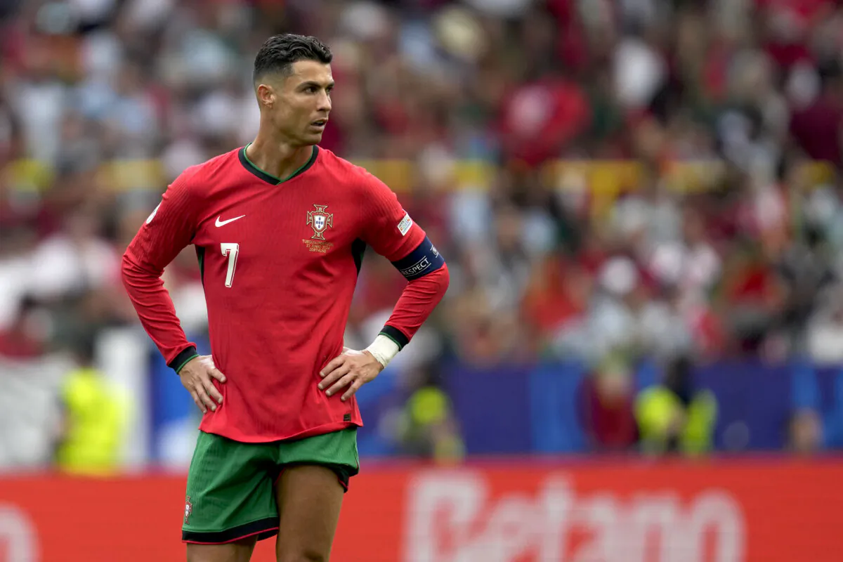 Portugal's Cristiano Ronaldo reacts during a Group F match between Turkey and Portugal at the Euro 2024 soccer tournament in Dortmund, Germany, on June 22, 2024. (Darko Vojinovic/AP Photo)
