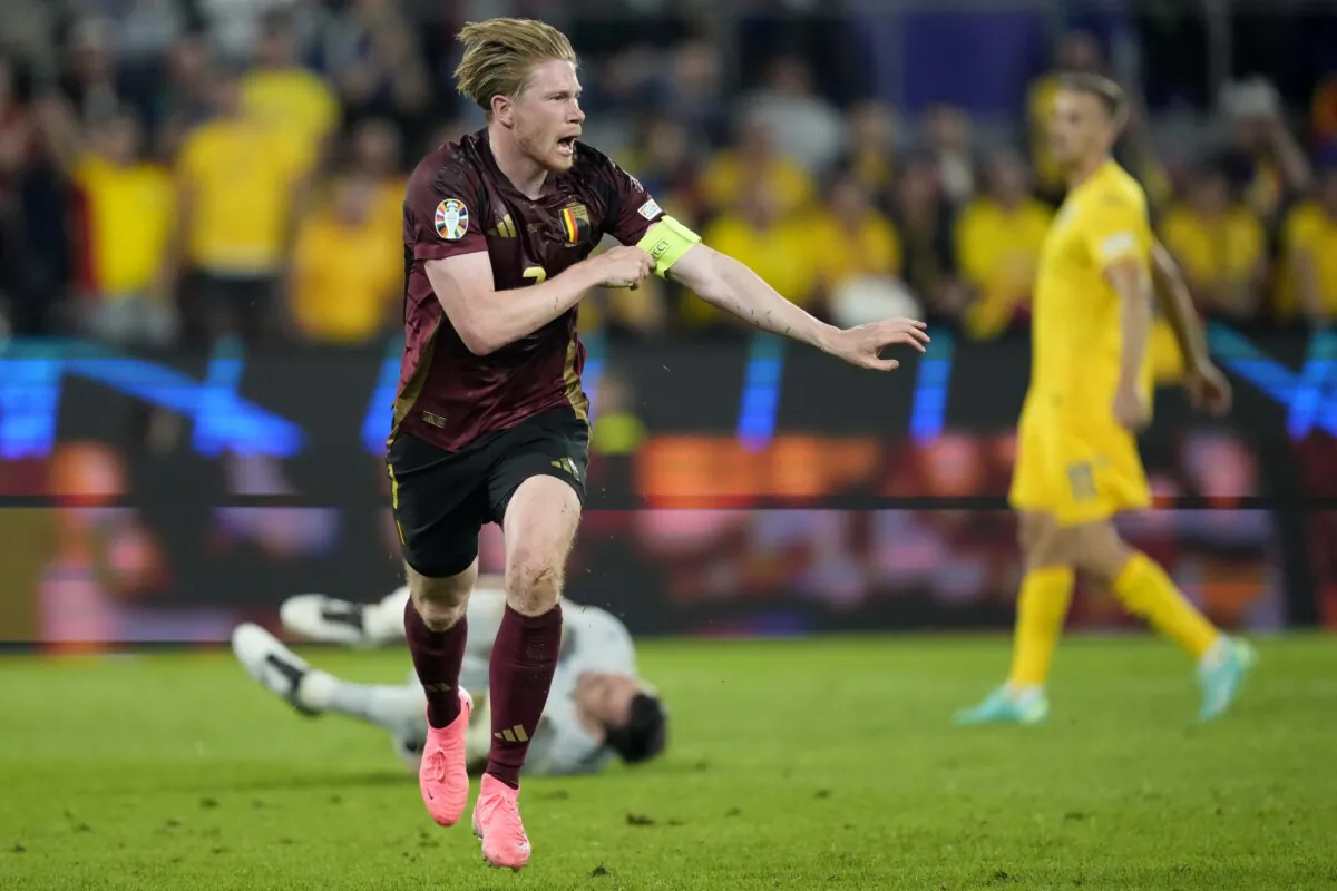 Belgium's Kevin De Bruyne celebrates after scoring his side's second goal during a Group E match between Belgium and Romania at the Euro 2024 soccer tournament in Cologne, Germany, on June 22, 2024. (Martin Meissner/AP Photo)
