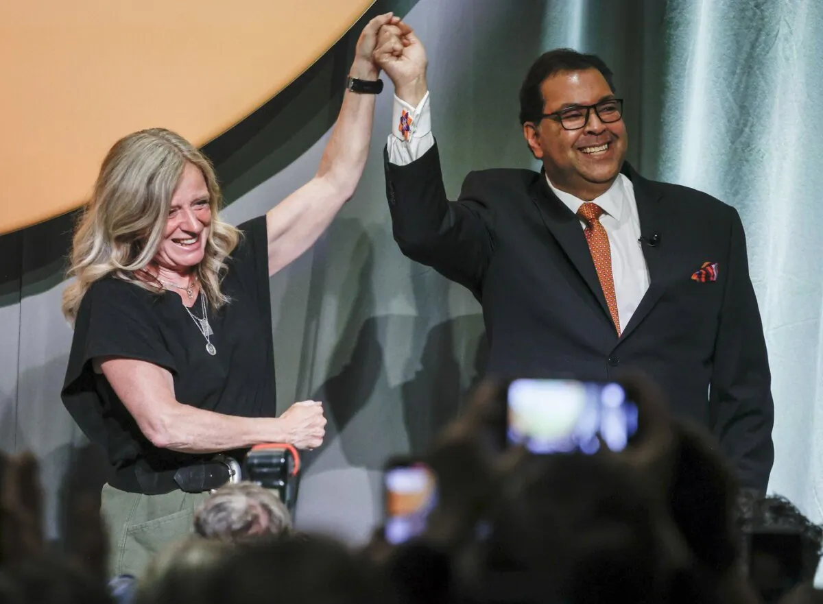Former Alberta NDP leader Rachel Notley (L) congratulates Naheed Nenshi after he was named as the new leader of the Alberta NDP in Calgary, on June 22, 2024. (The Canadian Press/Jeff McIntosh)