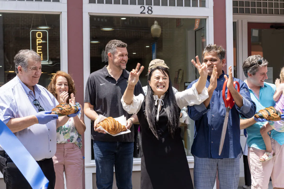 Rakesh Nayak (2nd R) and his wife celebrated the grand opening of Mister Croissant with Middletown Mayor Joseph Destefano (L), Congressman Patrick Ryan (3rd L) and New York state Sen. James Skoufis (R) in Middletown, N.Y., on June 22, 2024. (Cara Ding/The Epoch Times)