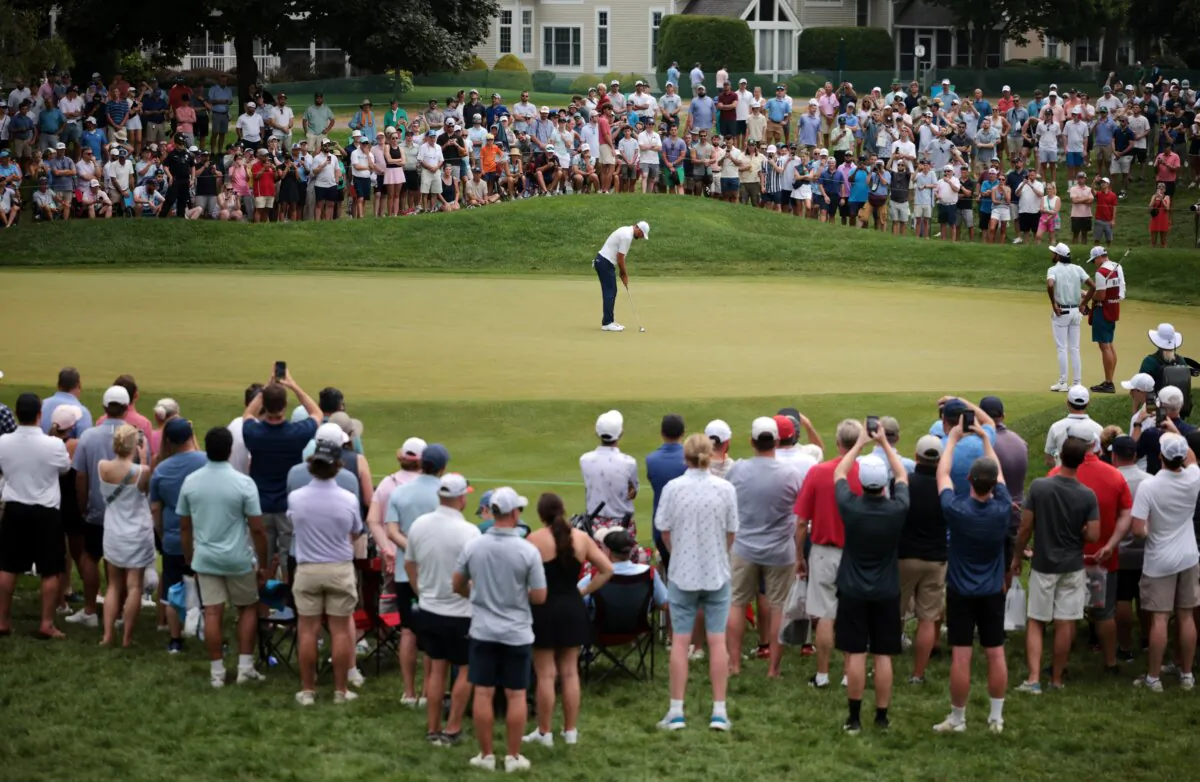 Scottie Scheffler of the United States putts on the seventh green during the third round of the Travelers Championship at TPC River Highlands in Cromwell, Conn., on June 22, 2024. (James Gilbert/Getty Images)