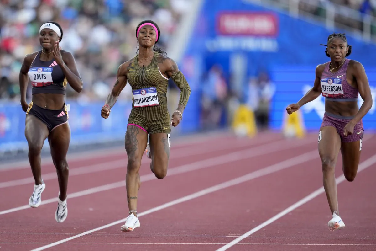 Sha'Carri Richardson celebrates her win in the wins women's 100-meter run final during the U.S. Track and Field Olympic Team Trials in Eugene, Ore., on June 22, 2024. (George Walker IV/AP Photo)