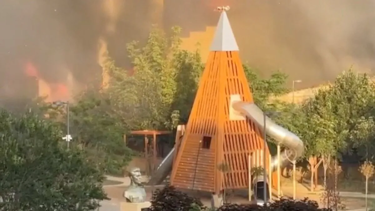 Plumes of smoke rise from a building in Derbent, Russia, on June 23, 2024, in a still from video. (Reuters)