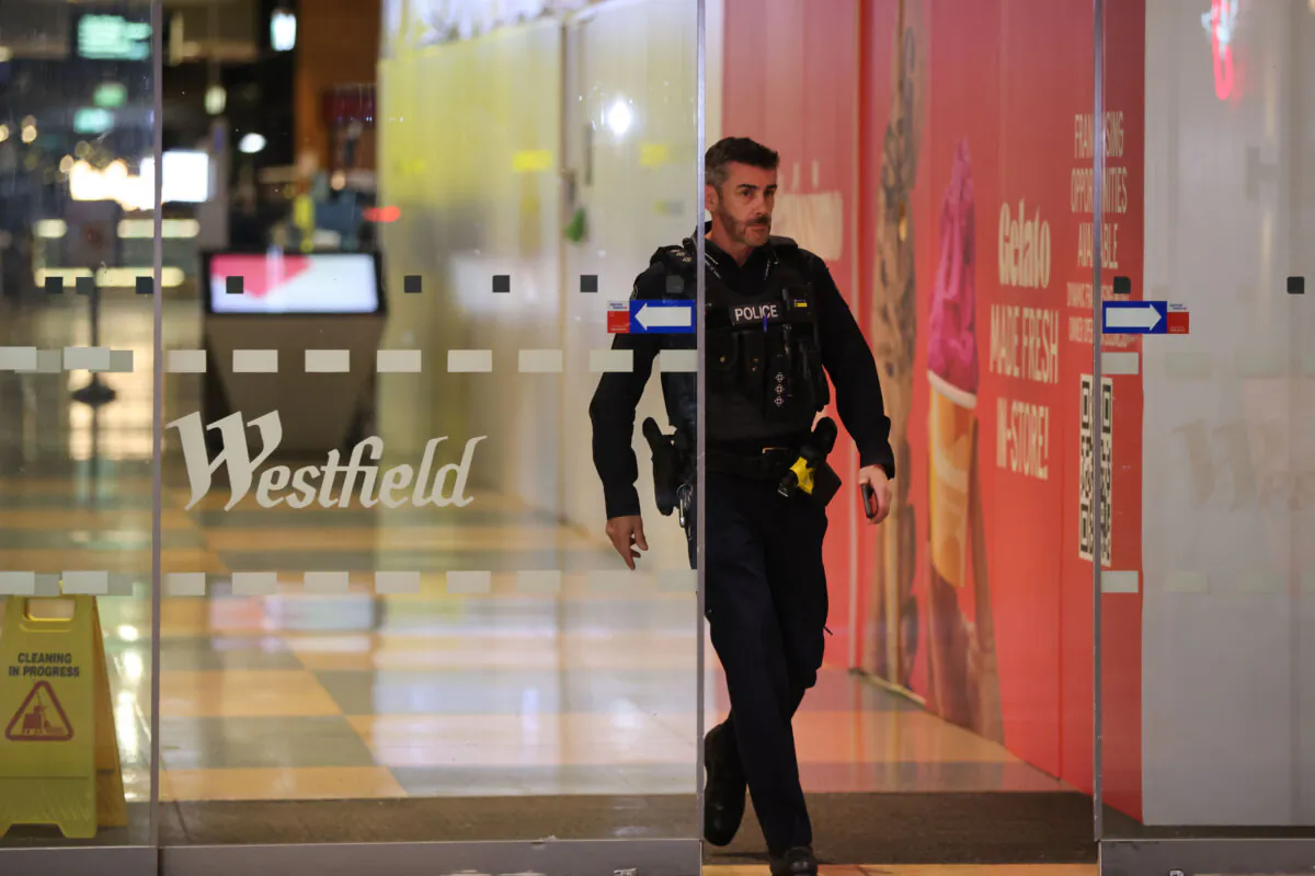 Police are seen at Westfield Marion Shopping Centre in Adelaide, Australia, on June 23, 2024. (AAP Image/Matt Turner)