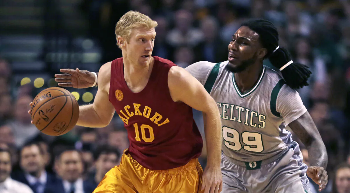 Indiana Pacers forward Chase Budinger (10) dribbles past Boston Celtics forward Jae Crowder (99) while bringing the ball down court during the first quarter of an NBA basketball game in Boston on Jan. 13, 2016. (Charles Krupa/AP Photo)