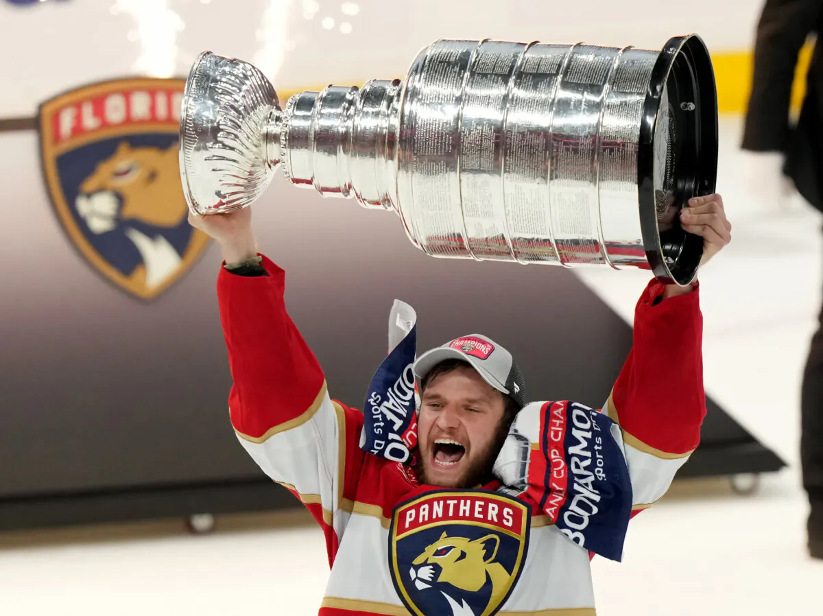Florida Panthers captain Aleksander Barkov hoists the Stanley Cup after his team's Game 7 win over the Edmonton Oilers in Sunrise, Fla., on June 24, 2024. (Nathan Denette/The Canadian Press via AP)