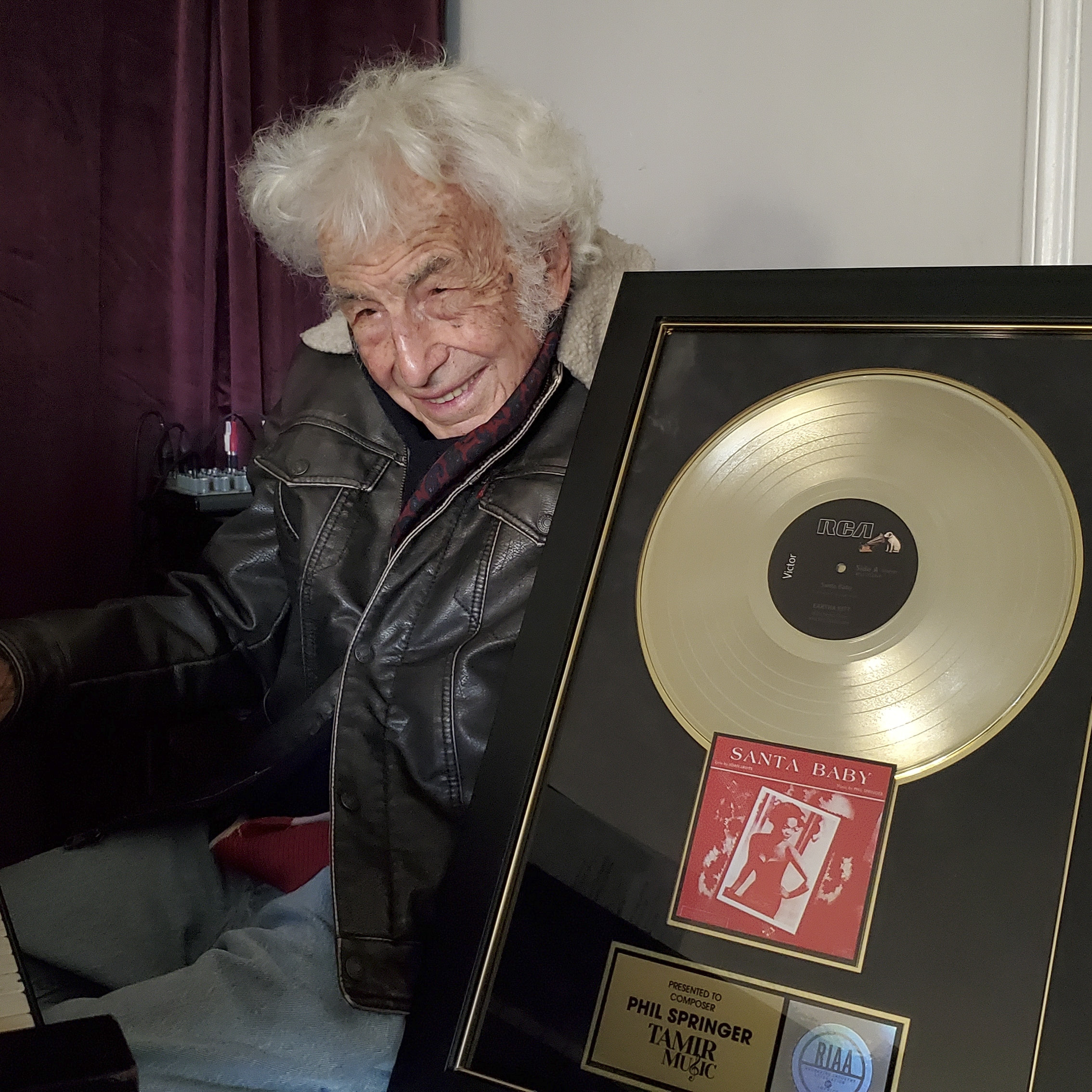 Mr. Springer with his gold record.