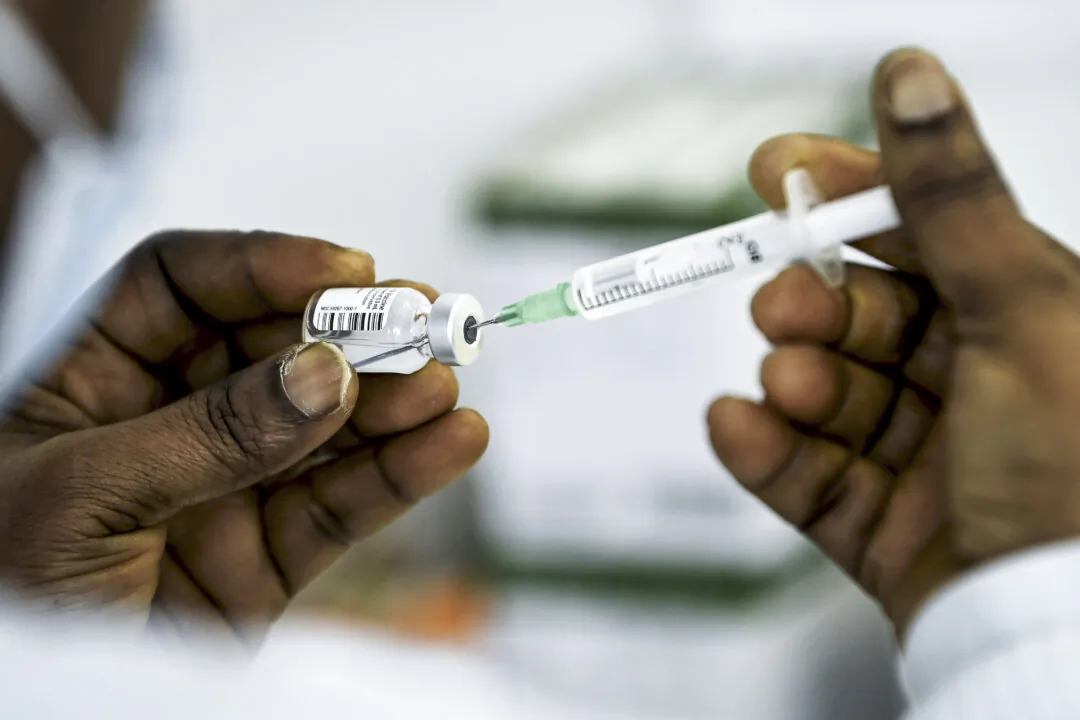 A health worker prepares a vaccine in Finland, in a file image. (Emmi Korhonen/Lehtikuva/AFP via Getty Images)