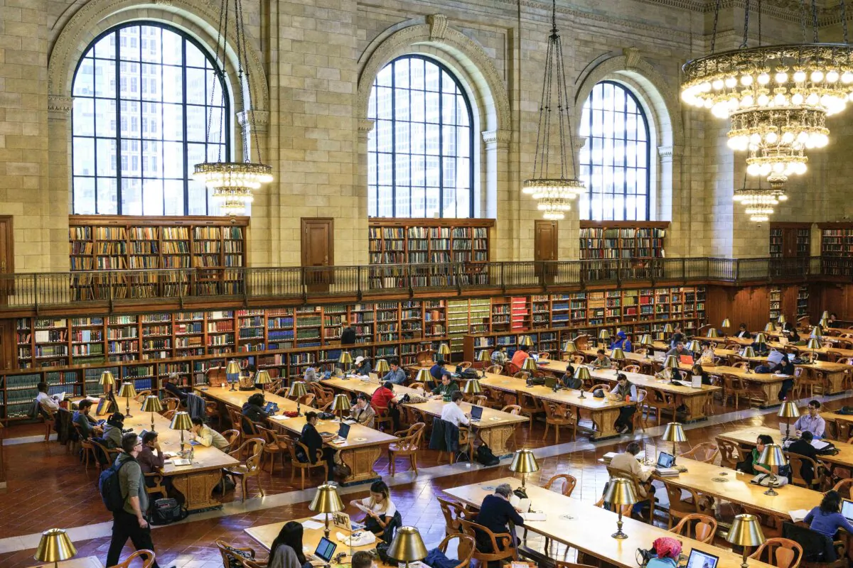 People work at desks in the Rose Main Reading Room at the New York Public Library in New York City on Oct. 5, 2016. (Drew Angerer/Getty Images)
