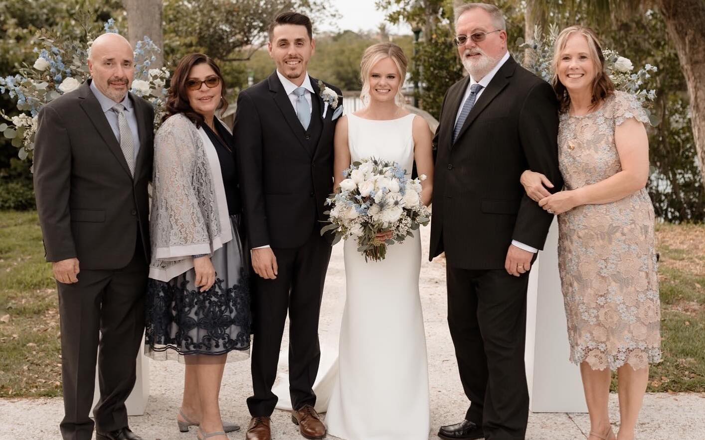 Mr. Alvarez and Ms. Alvarez with their families. 