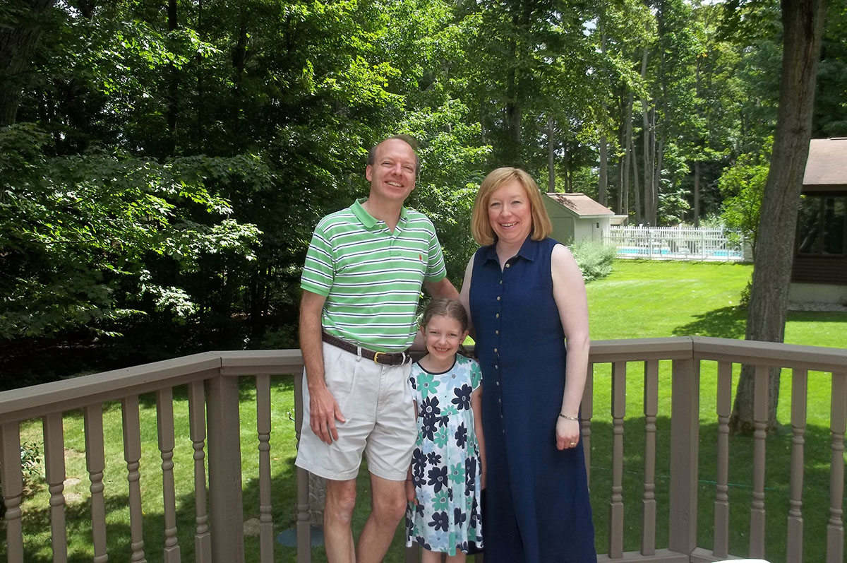 Mr. and Ms. Borrink with their daughter, Caroline.