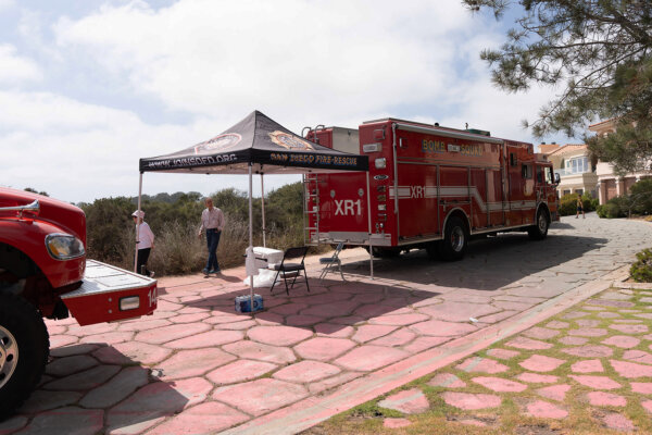 Fire Engine and Pink Fire Retardant Covered Pavement