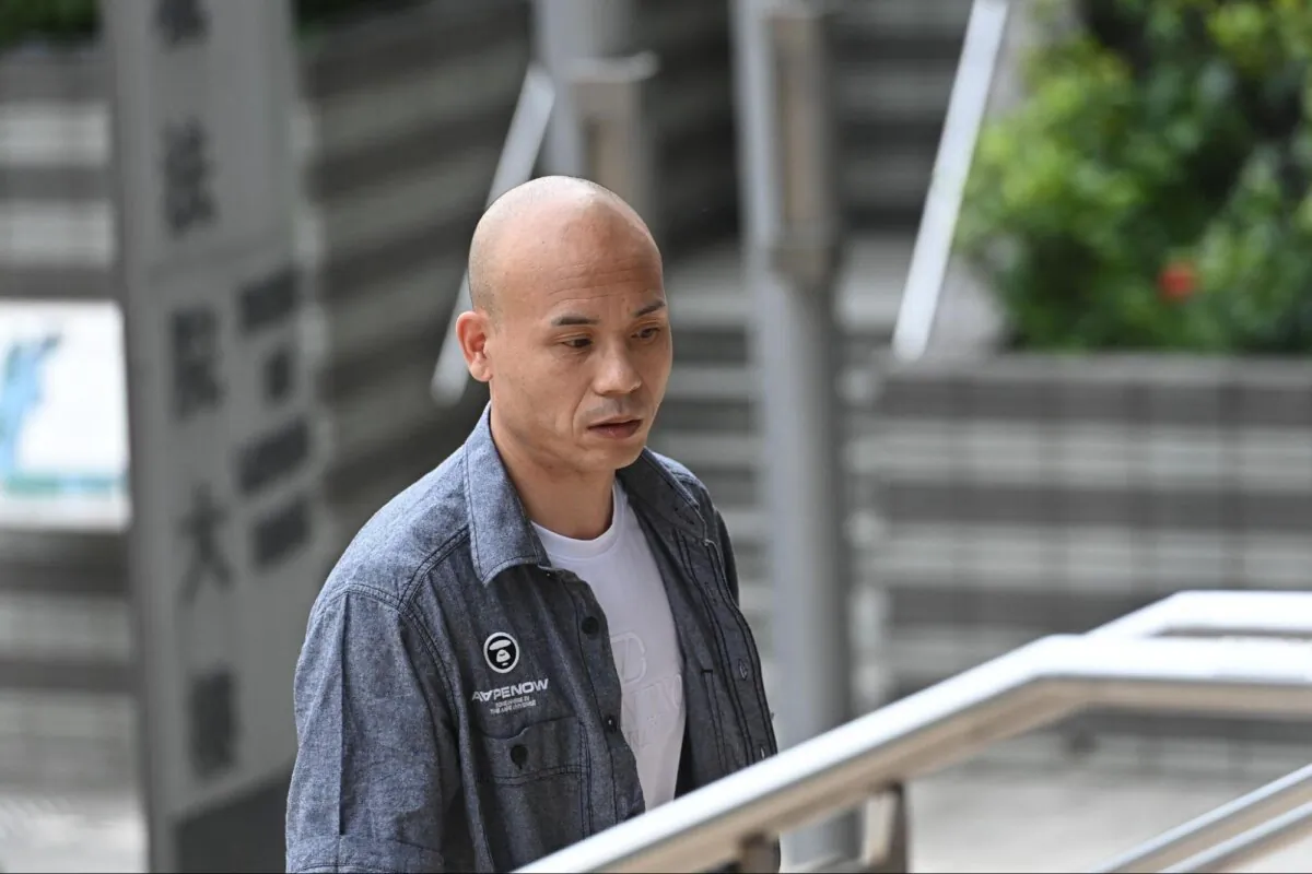 Mr. Hu Aimin was convicted on five counts of destroying Falun Gong information booths in Hong Kong in 2020, and was given suspended sentence. His appeal was rejected by the High Court on June 20, 2024. File photo. (Sung Pi-lung/The Epoch Times)