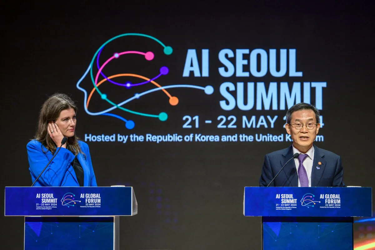 Britain's Secretary of State for Science, Innovation and Technology Michelle Donelan (L) listens as South Korea's Minister of Science and ICT Lee Jong-ho speaks during a press briefing following the ministers' session of the AI Seoul Summit at the Korea Institute of Science and Technology in Seoul on May 22, 2024. (Anthony Wallace/AFP via Getty Images)