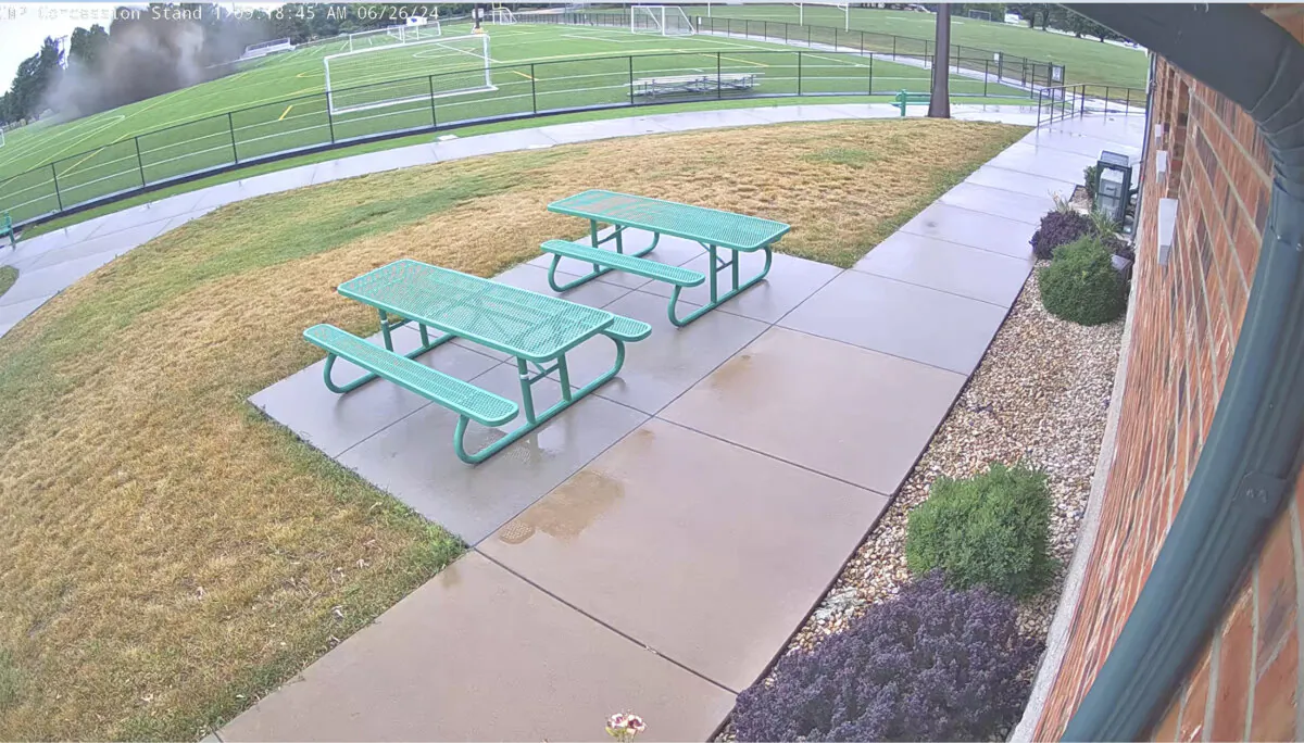 Security video of a sinkhole that opened in the middle of a soccer field in Alton, Ill., on June 26, 2024. (City of Alton, Ill. via AP)