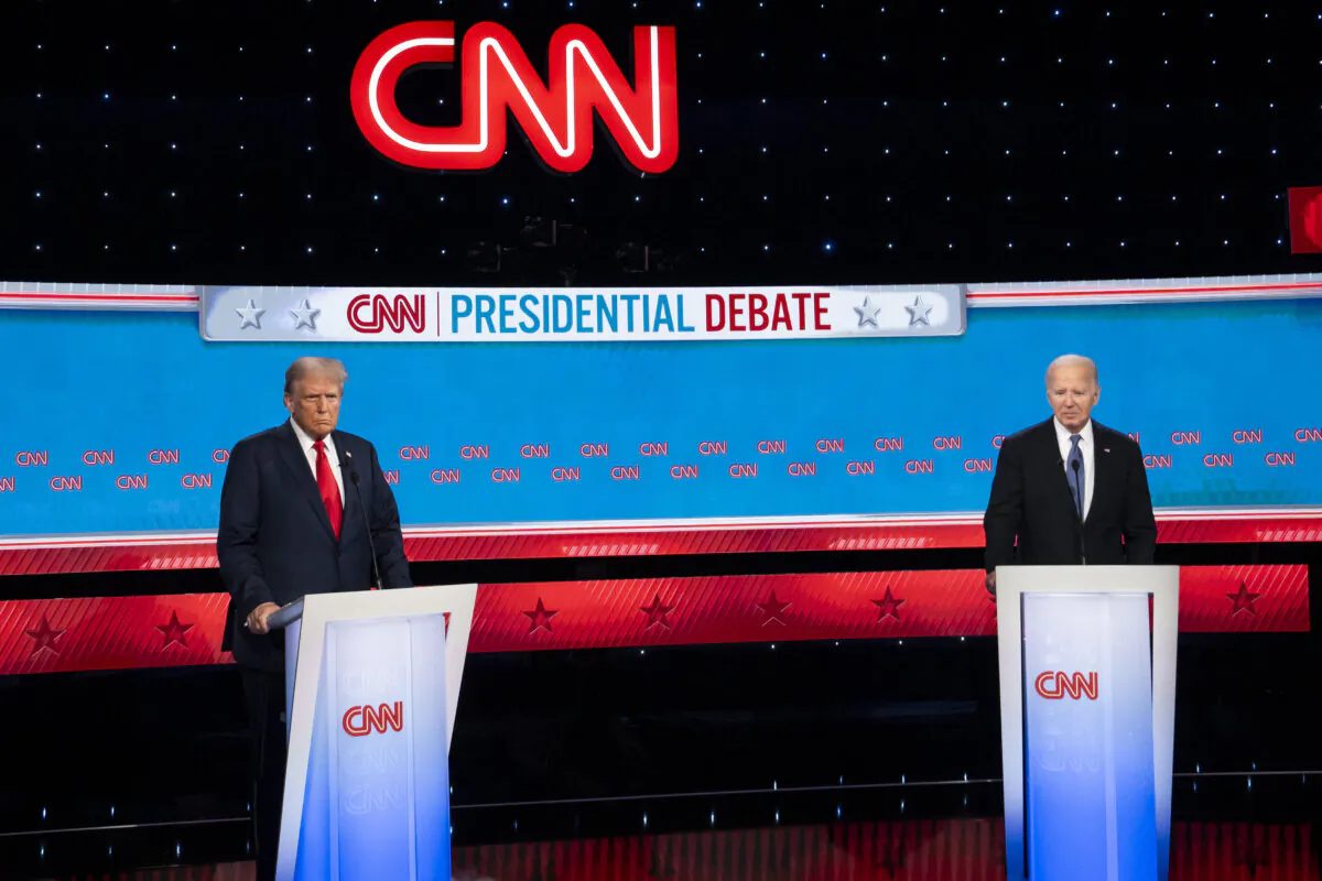 Former President Donald J. Trump (L) and President Joe Biden (R) during the presidential debate in Atlanta, Ga., on June 27, 2024. (Madalina Vasiliu/The Epoch Times)