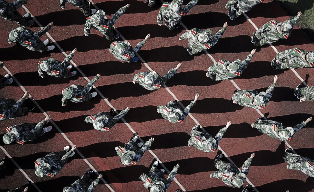 University freshmen take part in a military education and drill session at the beginning of the new semester in Yangzhou, eastern Jiangsu Province, China, on Sept. 4, 2018. (STR/AFP via Getty Images)