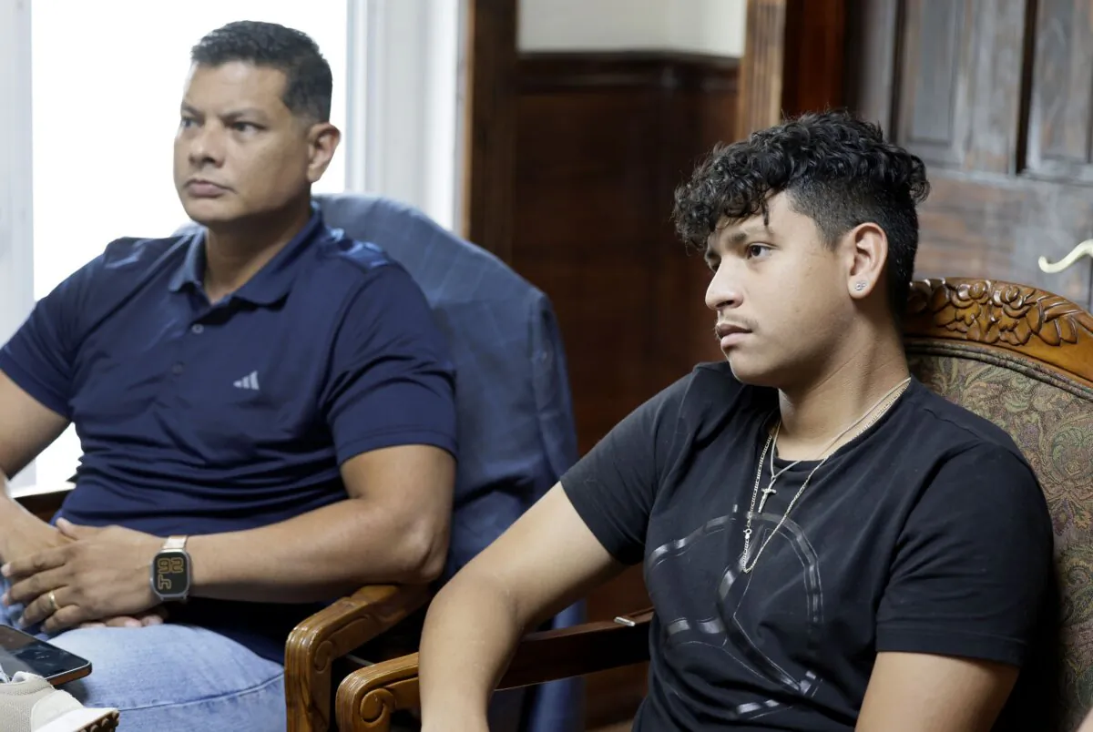 Royer Borges and his son, Parkland shooting victim Anthony Borges sit at their attorney's office in Wilton Manors, Fla., on June 26, 2024. (Carline Jean/South Florida Sun-Sentinel via AP)