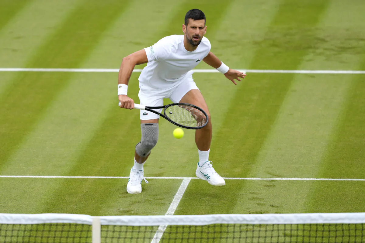 Novak Djokovic of Serbia plays a return during a training session on Court 2 at the All England Lawn Tennis and Croquet Club in Wimbledon, London, on June 28, 2024. (Kirsty Wigglesworth/AP Photo)