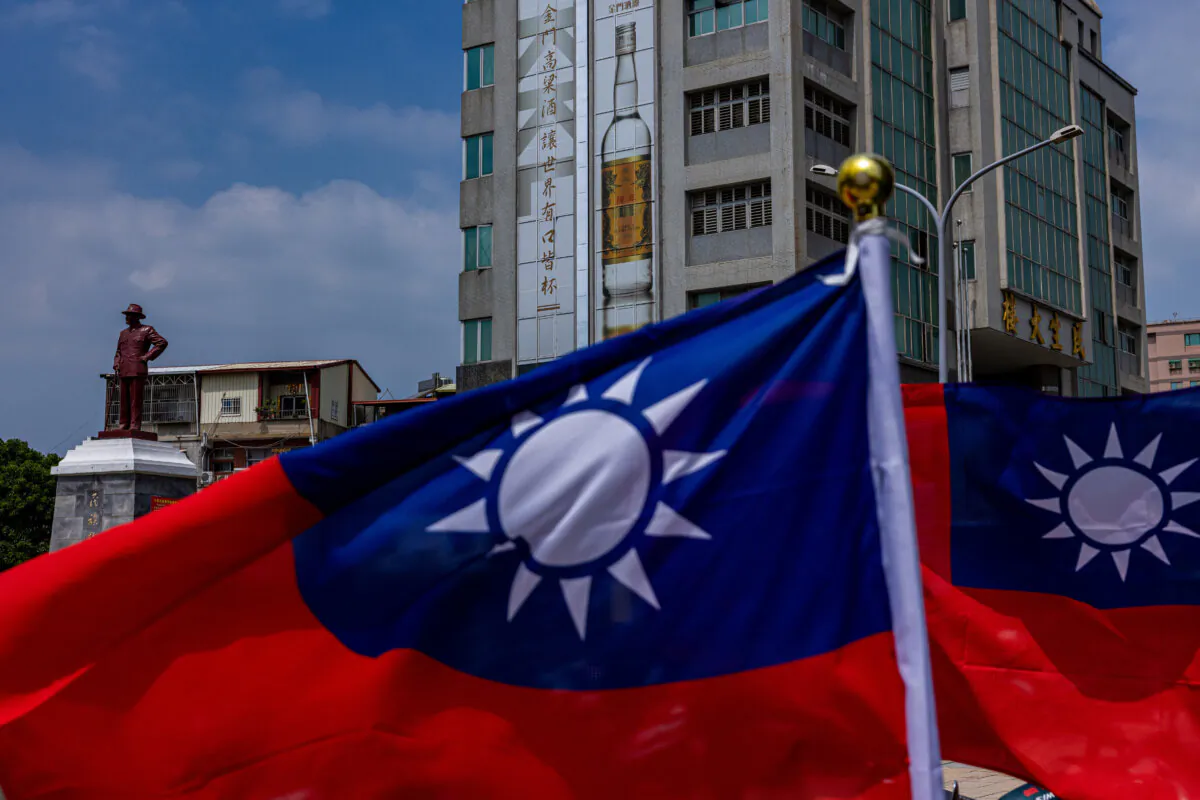 A bronze statue of the former leader of the Republic of China, Chiang Kai-shek, is seen behind the national flag of Taiwan in Kinmen, Taiwan, on Sept. 24, 2022. (Annabelle Chih/Getty Images)