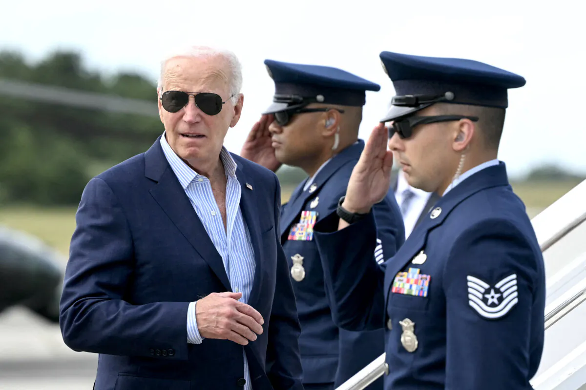 President Joe Biden boards Air Force One upon arrival at Francis S. Gabreski Airport in Westhampton Beach, N.Y., on June 29, 2024. (Mandel Ngan/AFP via Getty Images)