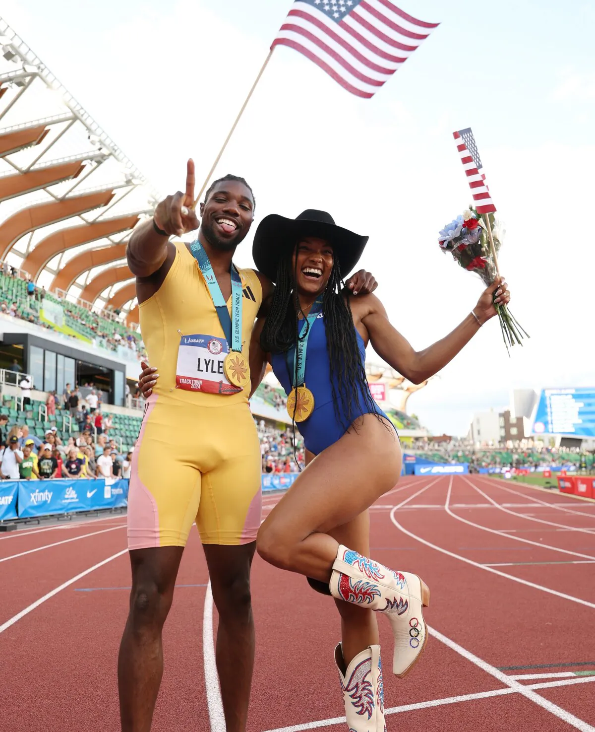 Gold medalist in the men's 200 meters Noah Lyles and gold medalist in the women's long jump Tara Davis-Woodhall pose on Day Nine of the 2024 U.S. Olympic Team Track & Field Trials in Eugene, Ore., on June 29, 2024. (Christian Petersen/Getty Images)
