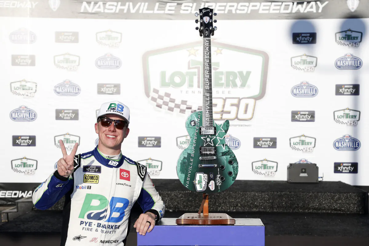 John Hunter Nemechek, driver of the #20 Pye Barker Fire & Safety Toyota, celebrates in victory lane after winning the NASCAR Xfinity Series Tennessee Lottery 250 at Nashville Superspeedway in Lebanon, Tenn., on June 29, 2024. (Sean Gardner/Getty Images)