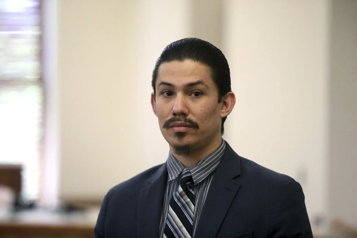 Anthony Martinez watches as the jury members leave the courtroom, after the jury found Martinez guilty of all charges including first-degree murder in the 2020 starvation death of his 6-year-old son,  in Flagstaff, Ariz., on May 23, 2024. (Jake Bacon/Arizona Daily Sun via AP)